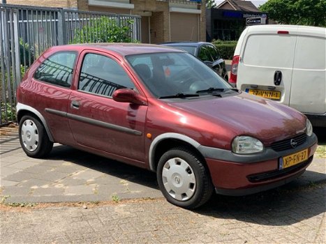 Opel Corsa - 1.2i-16V Strada - 1