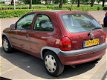 Opel Corsa - 1.2i-16V Strada - 1 - Thumbnail