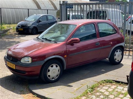 Opel Corsa - 1.2i-16V Strada - 1