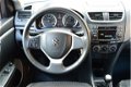 Suzuki Swift - 1.2 Comfort 5-Deurs met o.a. Airco en stoelverwarming - 1 - Thumbnail