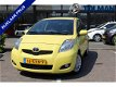 Toyota Yaris - 1.3 VVTi Dynamic | Rijklaar | Airco | Lichtmetalen velgen | Getint glas - 1 - Thumbnail