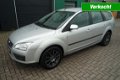 Ford Focus Wagon - 1.6 Airco, Parkeerhulp, Navi , D-riem vervangen - 1 - Thumbnail