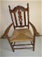 Antieke 19e eeuwse stoel met rieten zitting. - 1 - Thumbnail