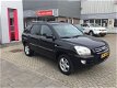 Kia Sportage - 2.0 CVVT X-pression - 1 - Thumbnail