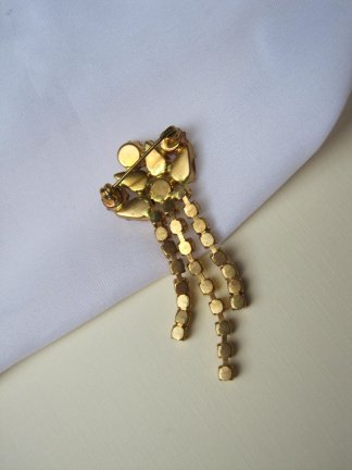 Broche goudkleurig met sliertjes en kristal rijnstenen 6.3x2.6 cm - Afbeelding 3