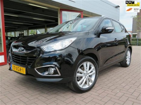 Hyundai ix35 - NAVIGATIE, LEDEREN BEKLEDING, PANORAMA DAK, EXTRA SET WINTERWIELEN, ZEER NETTE STAAT - 1