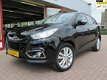 Hyundai ix35 - NAVIGATIE, LEDEREN BEKLEDING, PANORAMA DAK, EXTRA SET WINTERWIELEN, ZEER NETTE STAAT - 1 - Thumbnail