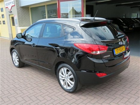 Hyundai ix35 - NAVIGATIE, LEDEREN BEKLEDING, PANORAMA DAK, EXTRA SET WINTERWIELEN, ZEER NETTE STAAT - 1