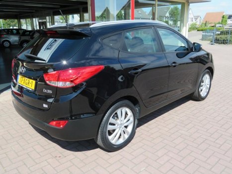 Hyundai ix35 - NAVIGATIE, LEDEREN BEKLEDING, PANORAMA DAK, EXTRA SET WINTERWIELEN, ZEER NETTE STAAT - 1