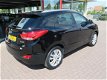 Hyundai ix35 - NAVIGATIE, LEDEREN BEKLEDING, PANORAMA DAK, EXTRA SET WINTERWIELEN, ZEER NETTE STAAT - 1 - Thumbnail