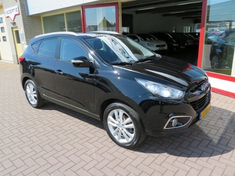 Hyundai ix35 - NAVIGATIE, LEDEREN BEKLEDING, PANORAMA DAK, EXTRA SET WINTERWIELEN, ZEER NETTE STAAT - 1