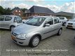 Opel Corsa - 1.2 16V 5D Enjoy Garage Onderhouden - 1 - Thumbnail