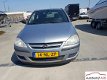 Opel Corsa - 1.0-12V Essentia tik in de motor wel - 1 - Thumbnail