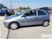 Opel Corsa - 1.0-12V Essentia tik in de motor wel - 1 - Thumbnail