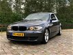 BMW 1-serie Coupé - 120d JAAR Apk - 1 - Thumbnail