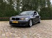 BMW 1-serie Coupé - 120d JAAR Apk - 1 - Thumbnail