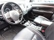 Mitsubishi Outlander - 2.0 PHEV Instyle Plus Aut7 4WD 50-50 deal (schuifdak, xenon, leer, camera) - 1 - Thumbnail