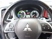 Mitsubishi Outlander - 2.0 PHEV Instyle Plus Aut7 4WD 50-50 deal (schuifdak, xenon, leer, camera) - 1 - Thumbnail