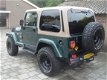 Jeep Wrangler - 4.0i Hardtop/Softtop Sahara - 1 - Thumbnail