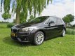 BMW 2-serie Active Tourer - 218i Executive 122000km NAVI LMV CRUISE *NL-AUTO - 1 - Thumbnail