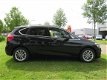 BMW 2-serie Active Tourer - 218i Executive 122000km NAVI LMV CRUISE *NL-AUTO - 1 - Thumbnail