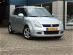 Suzuki Swift - 1.5 Exclusive Airco/Navigatie - 1 - Thumbnail