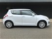 Suzuki Swift - 1.2 Exclusive EASSS Afkomstig van 1e eigenaar - 1 - Thumbnail