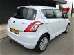 Suzuki Swift - 1.2 Exclusive EASSS Afkomstig van 1e eigenaar - 1 - Thumbnail