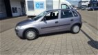 Opel Corsa - 1.2-16V Rhythm 5-DEURS - 1 - Thumbnail