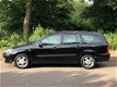 Ford Focus Wagon - 1.6-16V Trend APK t/m 30/05/2020 / Airco / El.Rmn / Trekhaak / Radio CD - 1 - Thumbnail