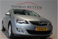 Opel Astra - 1.4 Cosmo 2010/ Clima/ Cruise/ Stuur bed./ PDC/ LM/ Elek ramen + Spiegels/ Stoel verw./ - 1 - Thumbnail