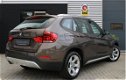 BMW X1 - 2.5d xDrive 218 pk Pano Navi Xenon Panoramadak Navigatie LED Automaat Nieuw Model Facelift - 1 - Thumbnail