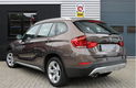 BMW X1 - 2.5d xDrive 218 pk Pano Navi Xenon Panoramadak Navigatie LED Automaat Nieuw Model Facelift - 1 - Thumbnail