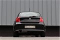 BMW 1-serie - 1.6 116i E87 Facelift 5 deurs | Vol leer | - 1 - Thumbnail