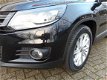 Volkswagen Tiguan - 1.4TSI 160PK BMT SportenStyle Navigatie, Xenon - 1 - Thumbnail