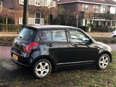 Suzuki Swift - 1.3 Exclusive airco nieuwe apk sportvelgen zeer netjes spoiler