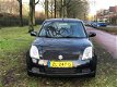 Suzuki Swift - 1.3 Exclusive airco nieuwe apk sportvelgen zeer netjes spoiler - 1 - Thumbnail