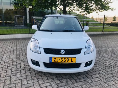 Suzuki Swift - 1.3 Comfort , CLIMATE, KEYLESS, BOEKJES - 1