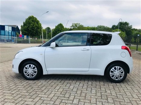 Suzuki Swift - 1.3 Comfort , CLIMATE, KEYLESS, BOEKJES - 1