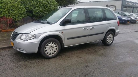 Chrysler Voyager - 2.4i SE Luxe - 1