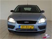 Ford Focus - - 1.4 59KW 5D Ambiente Airco/Cruise - 1 - Thumbnail