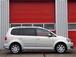 Volkswagen Touran - 1.2 TSI Comfortline 7P/ LAGE KM/ ZEER MOOI - 1 - Thumbnail