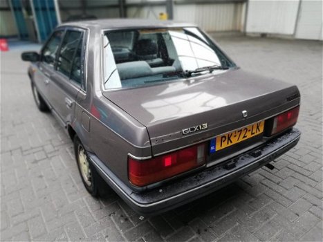 Mazda 323 - 1.3 LX H5 -OldTimer. NAP, 100% technische goed. Apk tot 3-2021 - 1