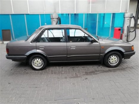 Mazda 323 - 1.3 LX H5 -OldTimer. NAP, 100% technische goed. Apk tot 3-2021 - 1