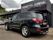 Hyundai Santa Fe - 2.7i V6 AUTOM 4WD 7 PERS STYLE LEDER SCHUIFDAK NAVI LMV PDC TREKHAAK - 1 - Thumbnail