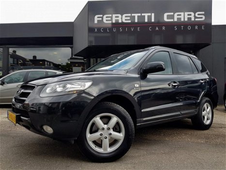 Hyundai Santa Fe - 2.7i V6 AUTOM 4WD 7 PERS STYLE LEDER SCHUIFDAK NAVI LMV PDC TREKHAAK - 1