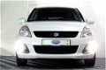 Suzuki Swift - 1.2 X-Tra EASSS 1eEIGNR LEDER CRUISE MFSTUUR STOELVERW. '15 - 1 - Thumbnail