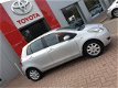 Toyota Yaris - 1.3 16v VVT-i Clima, Trekhaak, PDC, LMV - 1 - Thumbnail
