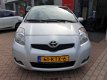 Toyota Yaris - 1.3 16v VVT-i Clima, Trekhaak, PDC, LMV - 1 - Thumbnail