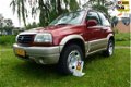 Suzuki Grand Vitara - 2.0 Metal Top Wide Body 4WD*airco*stuurbekr*2de eigenaar - 1 - Thumbnail